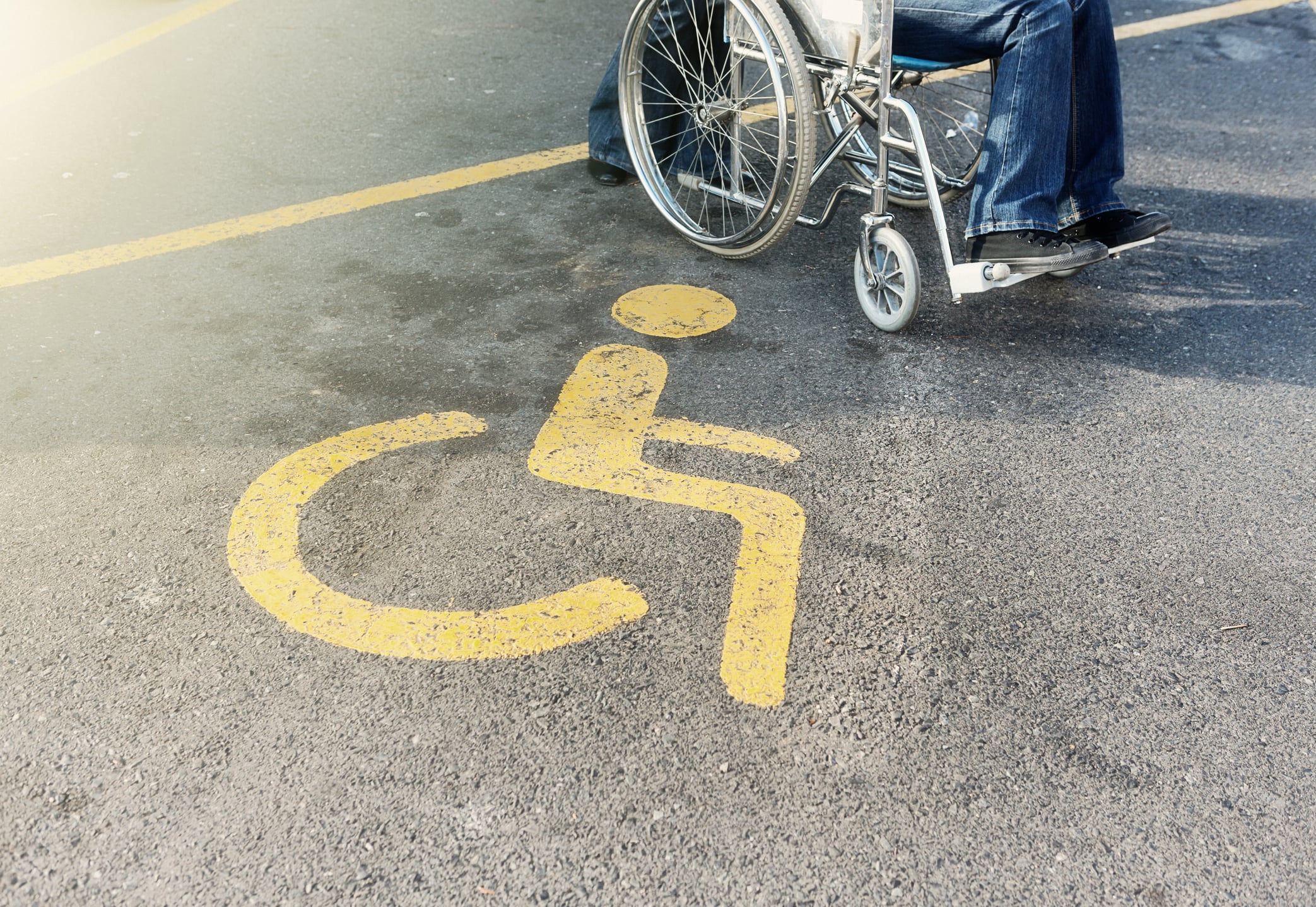 Accessability symbol and wheelchair. Photo.